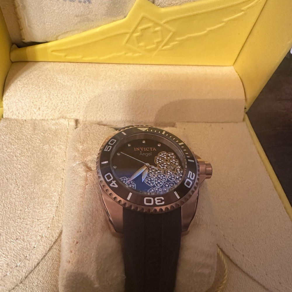 Brown beautiful designed Invicta watch.